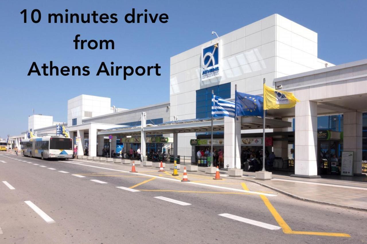 Nathaniel Athens Airport Spáta Esterno foto